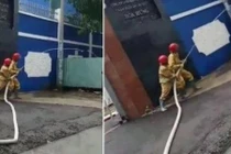 Video: Cứu hỏa phun nước nhỏ giọt như tưới cây gây tranh cãi kịch liệt