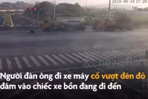 Video: Vượt đèn đỏ, người đàn ông suýt mất mạng dưới gầm xe container