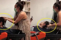 Video nhân viên gội đầu tát đầu khách bôm bốp hút 9 triệu lượt xem