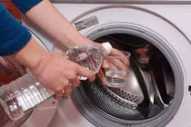 Mẹo "tống khứ" hết bụi bẩn, ký sinh trùng khỏi máy giặt