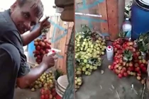 Video: Choáng váng bắt gặp người bán hàng phun sơn lên chùm nho
