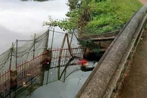 Phát hiện thi thể một người phụ nữ cùng hai chiếc xe máy “vô chủ”