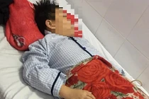 Bé trai bị bạn ép nuốt bi sắt nói gì khi tỉnh lại sau phẫu thuật