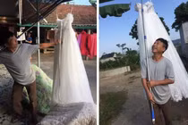 Kiếm được con rể, ông bố mang váy cưới đi khoe khắp làng