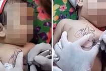 Video em bé bị giữ chặt để xăm hình ở Việt Nam lên báo nước ngoài
