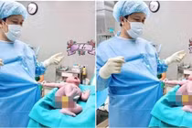Bé con vừa chào đời đã giật áo bác sĩ đầy hờn dỗi