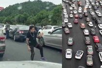 Video: Quý bà vô tư tập Thái Cực Quyền giữa cao tốc vì tắc đường