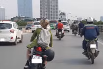 Cô gái lái xe phân khối lớn bị 'ném đá' vì lạng lách trên đường