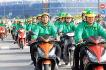 Thương vụ Grab "thâu tóm" Uber: "Ông lớn" taxi Việt đáp trả như thế nào?