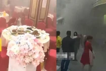 Cô dâu chú rể không rời hội trường cháy nổ vì nghĩ là báo hiệu vui