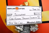 Dùng tiền trúng số để mua thêm vé số, người phụ nữ trúng tiếp tiền tỷ