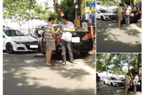 Sau va chạm xe, hai tài xế xuống bắt tay nhau và phân làn đường