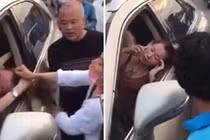 Bị đánh ghen, cô bồ vẫn cố thủ trên xe gọi điện cho nhân tình