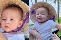 Biểu cảm của cặp song sinh nhà Hà Hồ khi đội nón lá