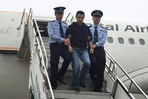 Quan tham TQ về nước đầu thú sau 5 năm trốn nã