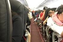 Cặp vợ chồng đánh nhau trên máy bay chưa nộp phạt