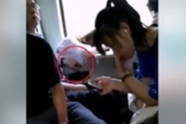 Video: Sàm sỡ cô gái ngủ say trên tàu, gã “trí thức” bị tát bay cả kính