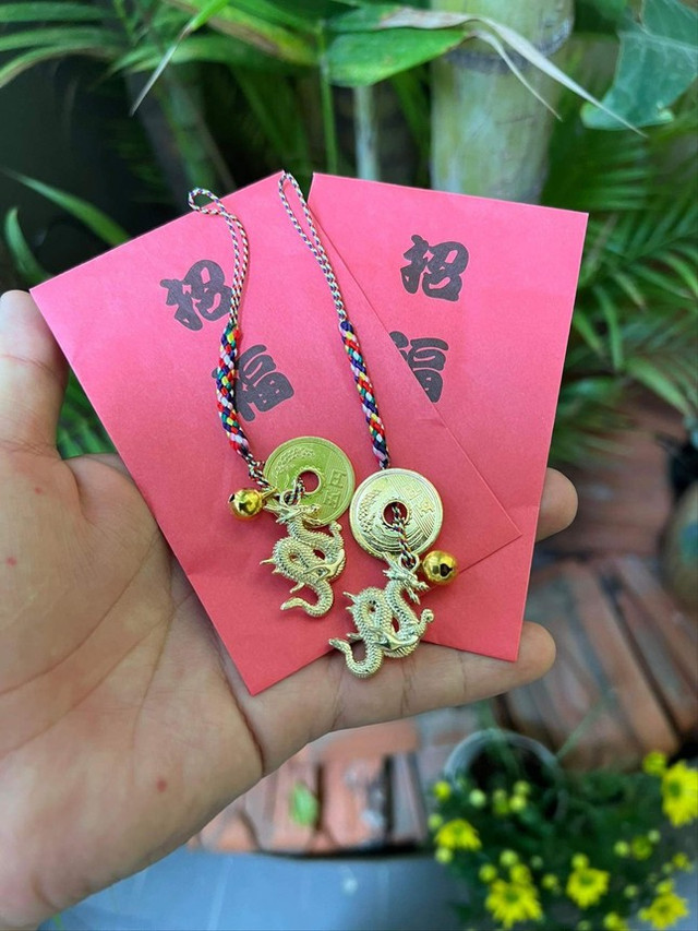 Khan hiếm tiền lì xì mệnh giá thấp, tiền in rồng Tết lên ngôi Khan hiem tien li xi menh gia thap, tien in rong Tet len ngoi