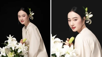 Angela Phương Trinh gây chú ý tạo dáng bên hoa loa kèn