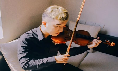 Chân dung chàng trai trong clip chơi violin ở Hang Én