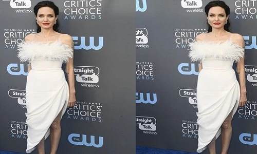 Angelina Jolie diện váy cúp ngực, khoe hình xăm lớn tại sự kiện