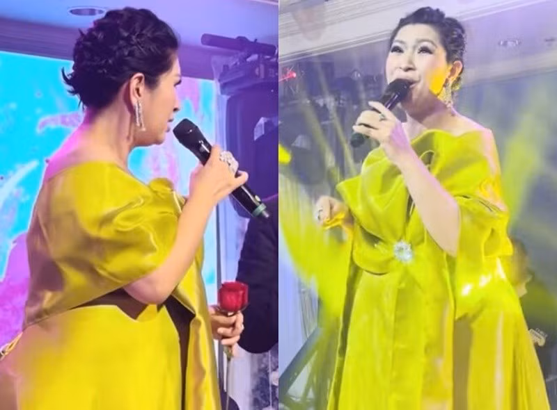 Nguyễn Hồng Nhung đang mang bầu 8 tháng. Dù bụng bầu vượt mặt, cô vẫn đi hát. Ảnh: Người Đưa Tin.