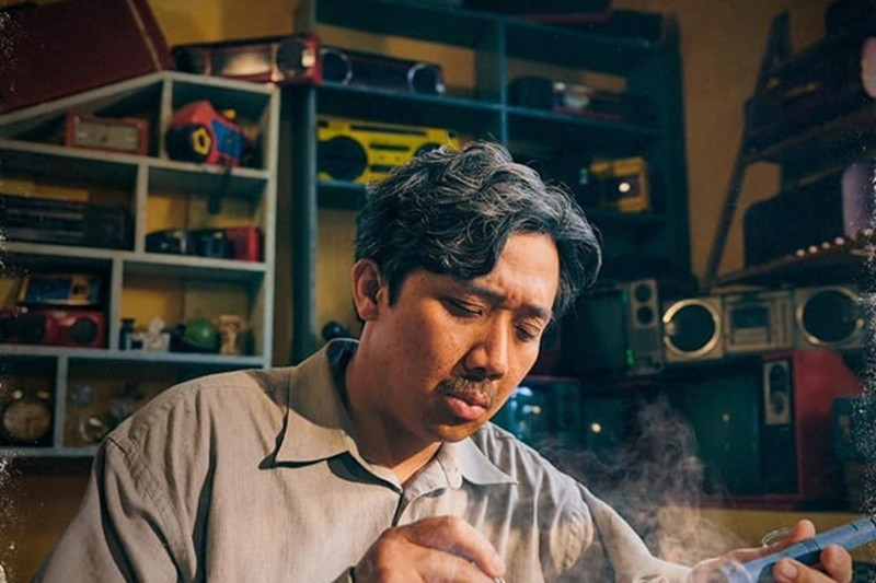 Năm 2021 đánh dấu bước ngoặt khi Trấn Thành ra mắt phim điện ảnh “Bố già”. Anh tham gia sản xuất, đạo diễn và đóng chính. Tác phẩm đạt doanh thu 427 tỷ đồng. Ảnh: Người Lao Động.