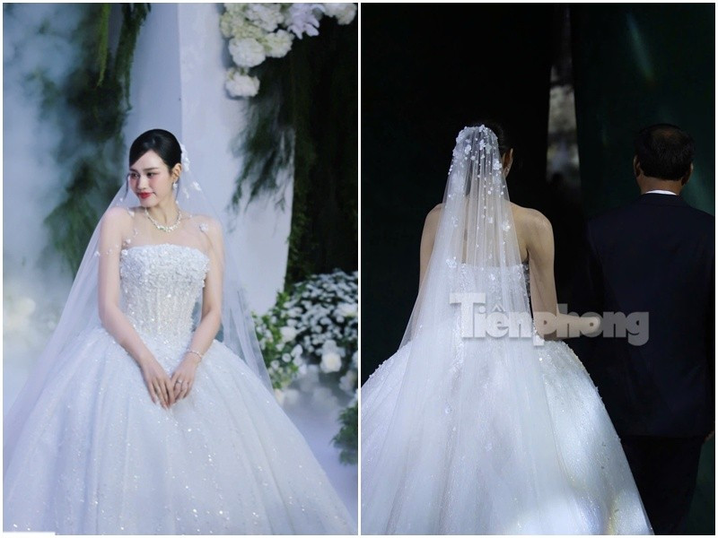 Đỗ Thị Hà đẹp như nàng công chúa trong đám cưới khi diện chiếc váy trắng đính kết pha lê tinh xảo. Ảnh: Tiền Phong.