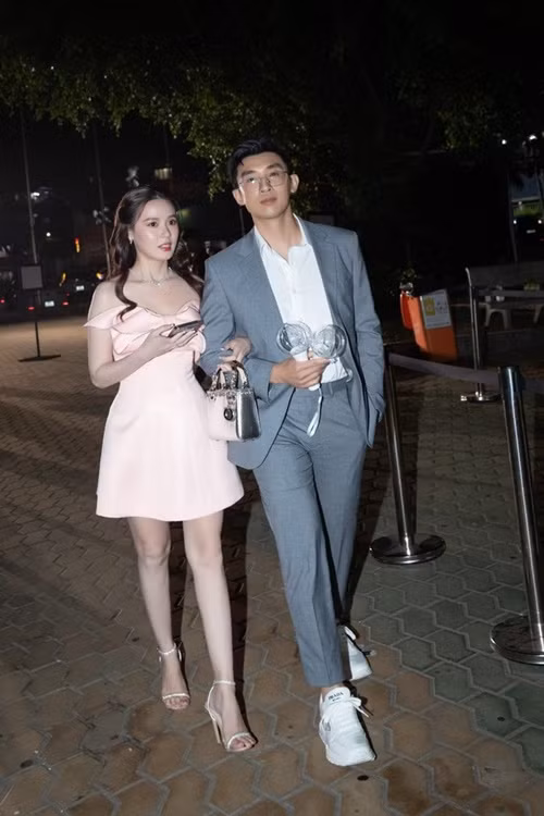 Vợ chồng Midu sánh đôi trong đêm nhạc của Trung Quân Idol trong tháng 7. Ảnh: Hoa Học Trò.