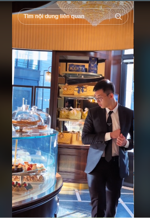 Midu đăng tải clip quay lén Minh Đạt đang lựa chọn bánh cho vợ. Ảnh: TikTok Midu.