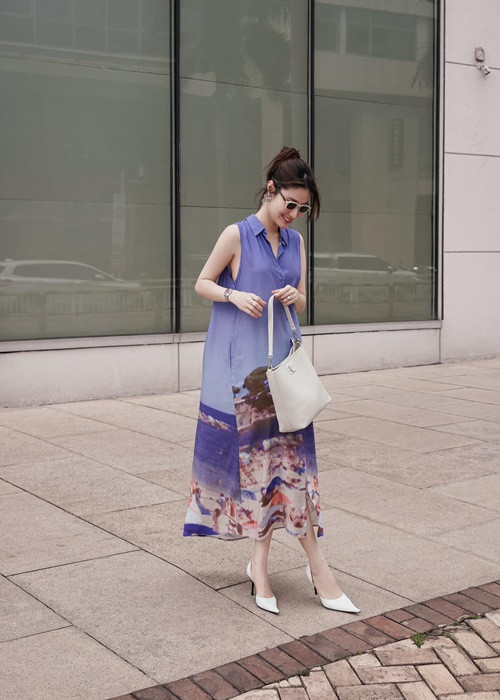 Dường như nữ diễn viên cố ý giấu vòng hai. Ảnh: FB Diễm My.