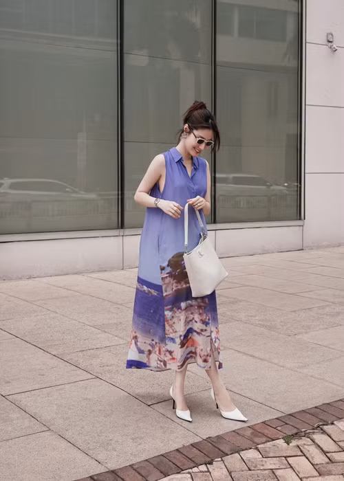 Dường như nữ diễn viên cố ý giấu vòng hai. Ảnh: FB Diễm My.