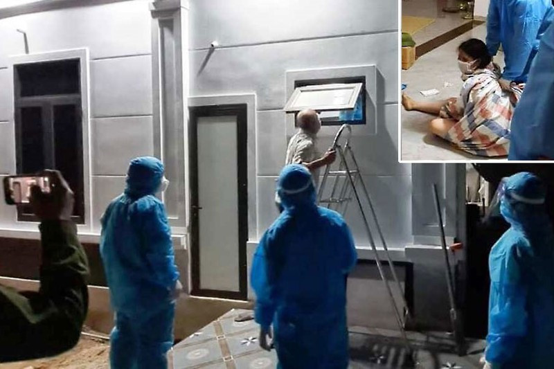 Khoi to bi can nguoi coi quan ao, chong doi di cach ly