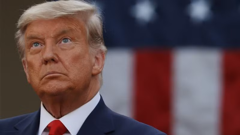 Doi ong Trump rut don kien o Michigan vi da “dat muc dich“