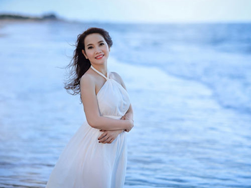 Bà xã của Cao Minh Đạt sở hữu vẻ ngoài dịu dàng, nữ tính. Ảnh: Khám phá