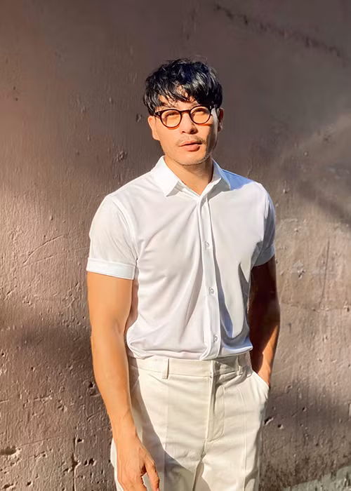 Trương Thanh Long sở hữu thân hình cơ bắp săn chắc, gương mặt điển trai.