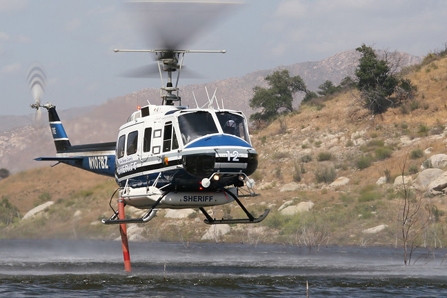 Lục quân Mỹ cũng cho rút AH-1 khỏi lực lượng dự bị vào tháng 9/2001. Những chiếc AH-1 đã nghỉ hưu sau đó được thanh lý, thường thông qua việc bán cho các khách hàng ở nước ngoài, đơn vị cuối cùng của phi đội đã được thanh lý vào năm 2010. Một số cũng được trao cho Cơ quan Lâm nghiệp của Mỹ.