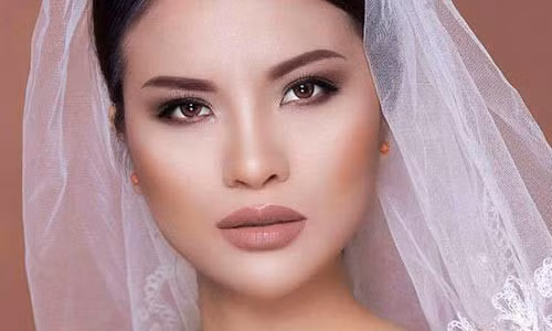 Le Thi Phuong Next Top Model sap len xe hoa lan hai