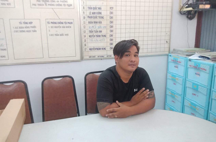 Đối tượng Tô Quốc Toàn tại cơ quan điều tra.