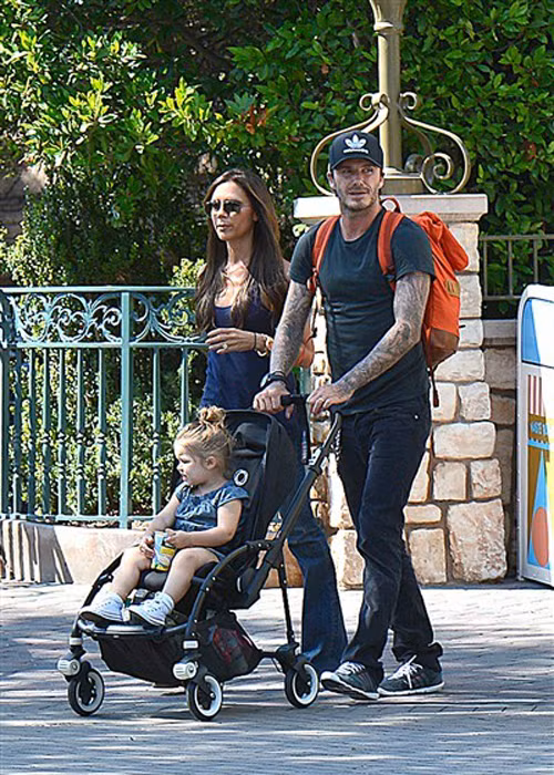 David và bà xã cùng tận hưởng thời gian bình yên bên con gái út tại công viên Disneyland vào tháng 8/2013.