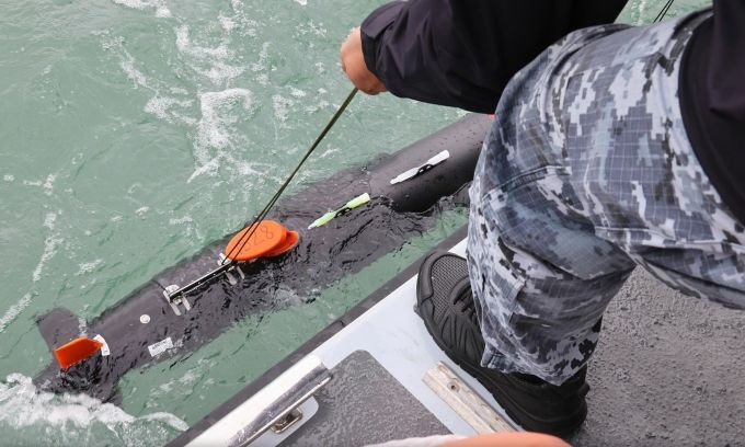 Ukraine bat dau don dep bien Den, mo duong bien cho vien tro My