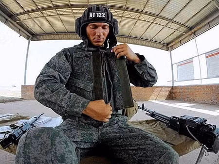  Áo giáp 6B15-1 (các mảnh ngực và lưng, cổ áo bẻ) có các túi nổi để cất giữ đồ dùng biên chế và thiết bị cứu cấp. Áo giáp bảo vệ lưng và ngực chống mảnh đạn và đạn súng ngắn K59 bắn từ cự ly 5 m.