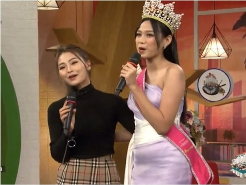 Fan bênh vực Đỗ Thị Hà cho rằng do chất liệu trang phục vải bóng nên bụng của cô trông ngấn mỡ. Ảnh: Yan