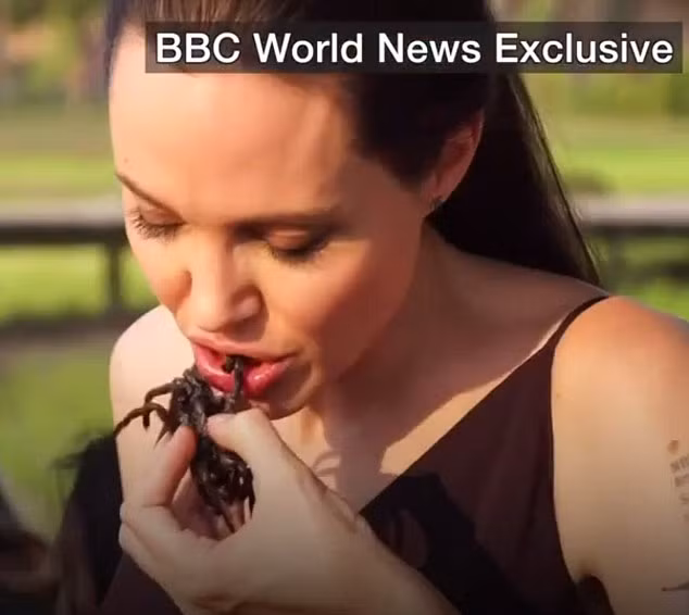 7 me con Angelina Jolie an bo cap, nhen o Cambodia