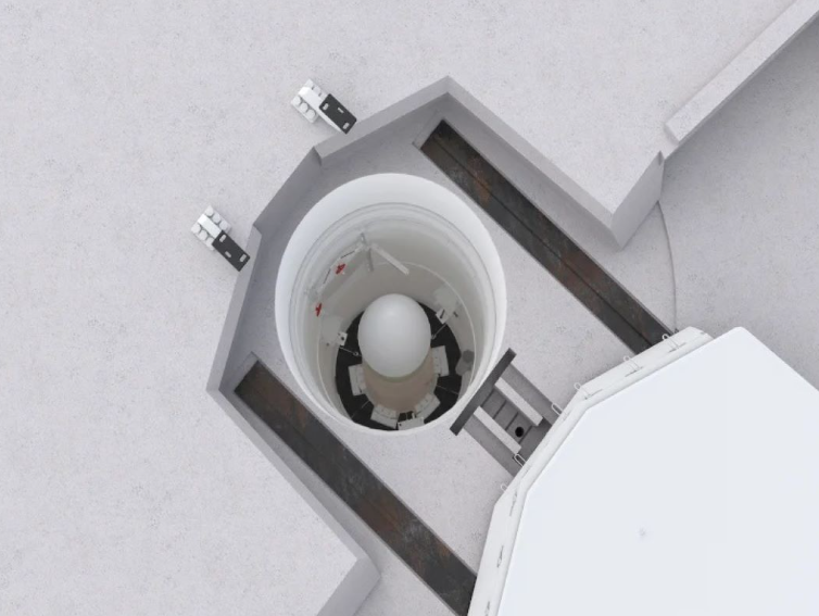 Phương tiện chở đầu đạn MK21A dự kiến được sử dụng để đưa đầu đạn vào không gian, nó sẽ quay lại bầu khí quyển trước khi tiếp cận mục tiêu nên còn gọi là phương tiện tái nhập (re-entry vehicle, hay RV). Vai trò chính của RV là đưa đầu đạn đi tới mục tiêu đã định. Ở giữa chuyến bay, RV sẽ tách khỏi tầng 3 của tên lửa, quay lại bầu khí quyển rồi lao xuống mục tiêu. RV được thiết kế để chịu được nhiệt độ và áp suất cực cao tạo ra trong quá trình hồi quyển, nó còn có tấm chắn nhiệt để bảo vệ đầu đạn.