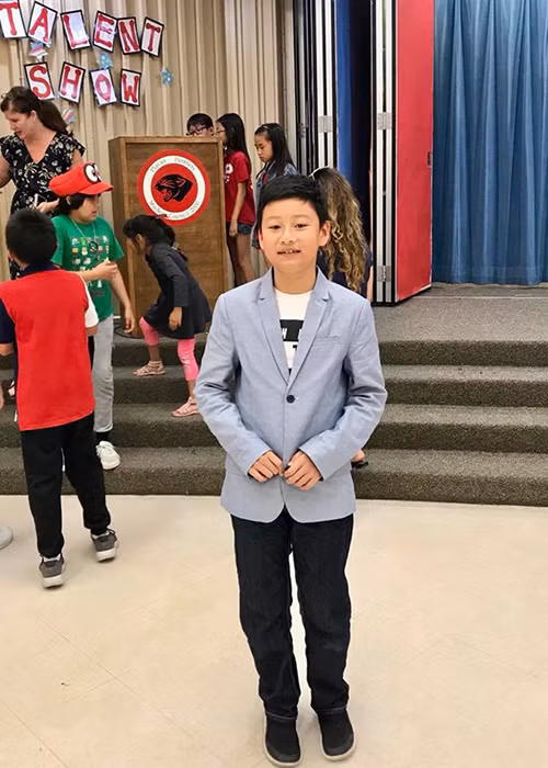 Ở tuổi 12, Bảo Nam có lẽ biết bố mẹ là người nổi tiếng.