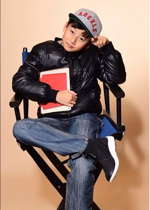 Con trai của Quang Dũng học giỏi, ngoan ngoãn và càng lớn càng điển trai giống bố.