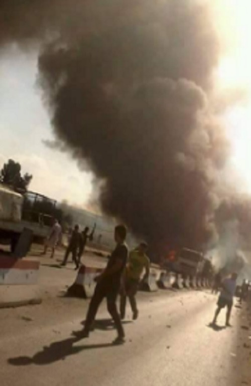 Hiện trường vụ đánh bom xe kinh hoàng ở Syria.