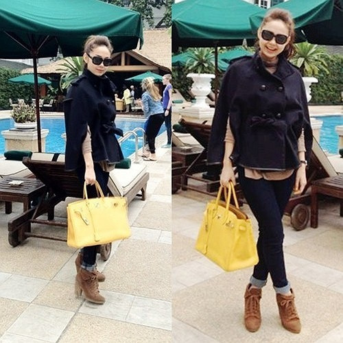 Minh Hằng sành điệu dạo phố với chiếc túi xách hàng hiệu Hermes Birkin màu vàng có giá hơn 200 triệu đồng.