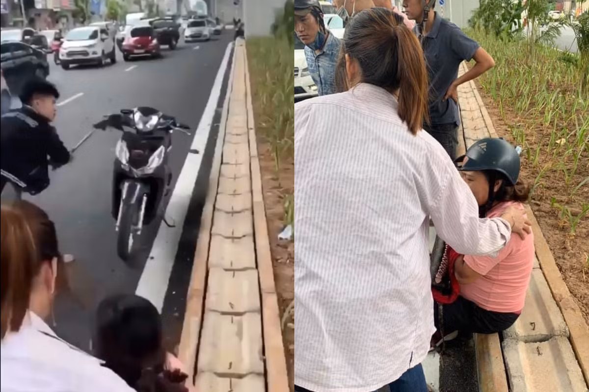 Trong clip, người phụ nữ mang bầu đang ngồi ở vệ đường được một số người dân hỏi han, chăm sóc. Gần đó, một thanh niên trong nhóm đang hung hăng cầm vật giống tuýp sắt lao ra giữa đường chửi bới rồi bất ngờ chạy đến đập nát đầu chiếc xe máy dựng bên đường.